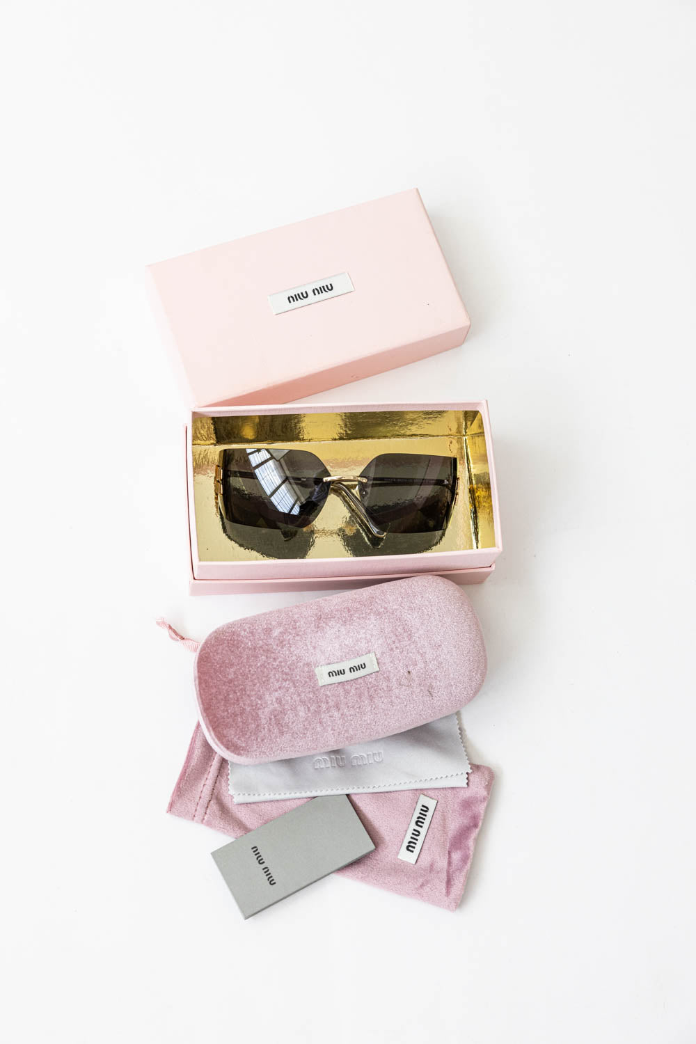 Miu Miu MU 54YS Rimless Black Sunglasses