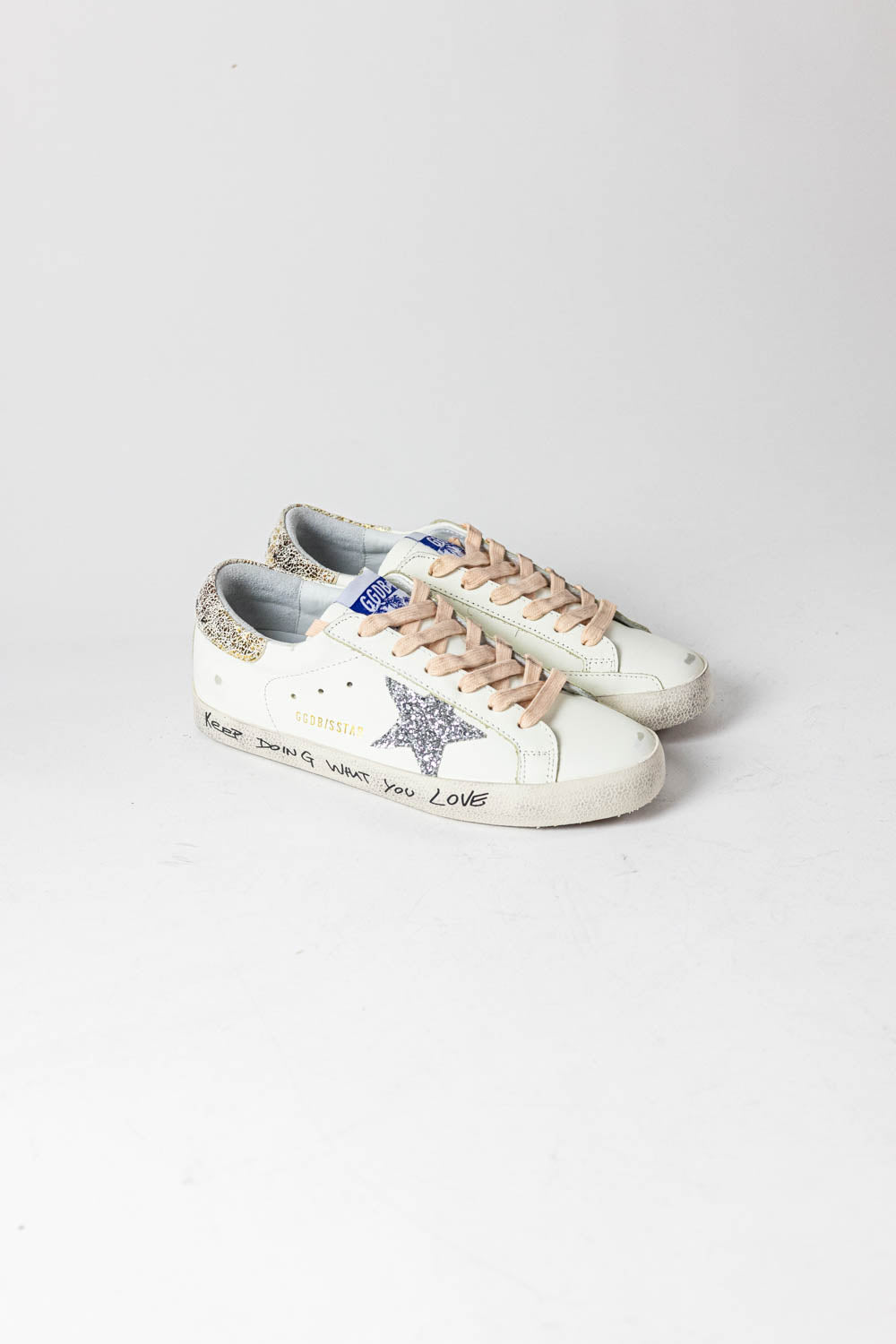 Golden Goose Super-Star with silver glitter star and leopard print heel tab