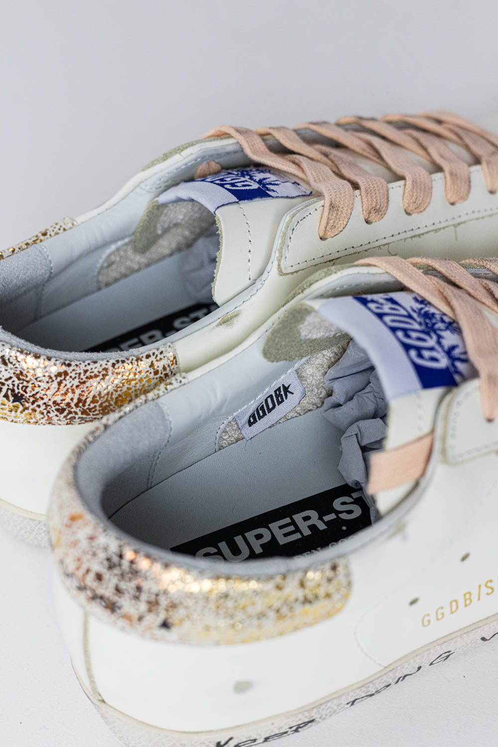 Golden Goose Super-Star with silver glitter star and leopard print heel tab