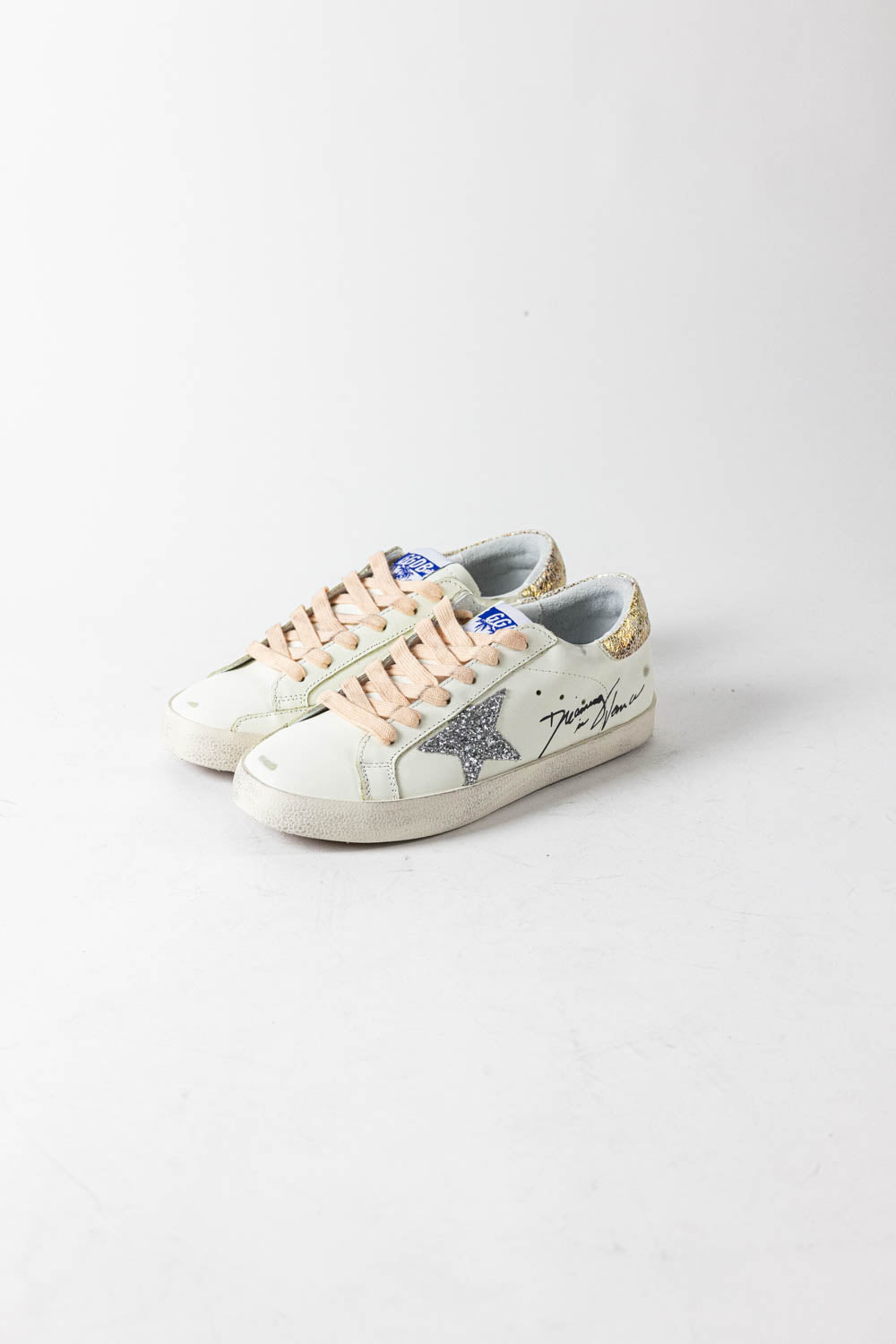 Golden Goose Super-Star with silver glitter star and leopard print heel tab