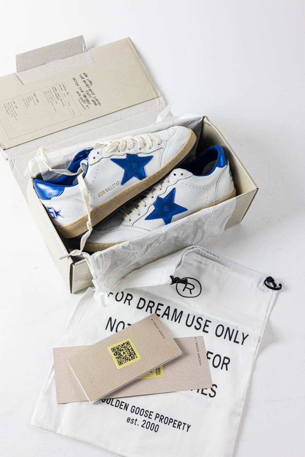 Golden Goose Ball Star in white nappa leather with a blue star and heel