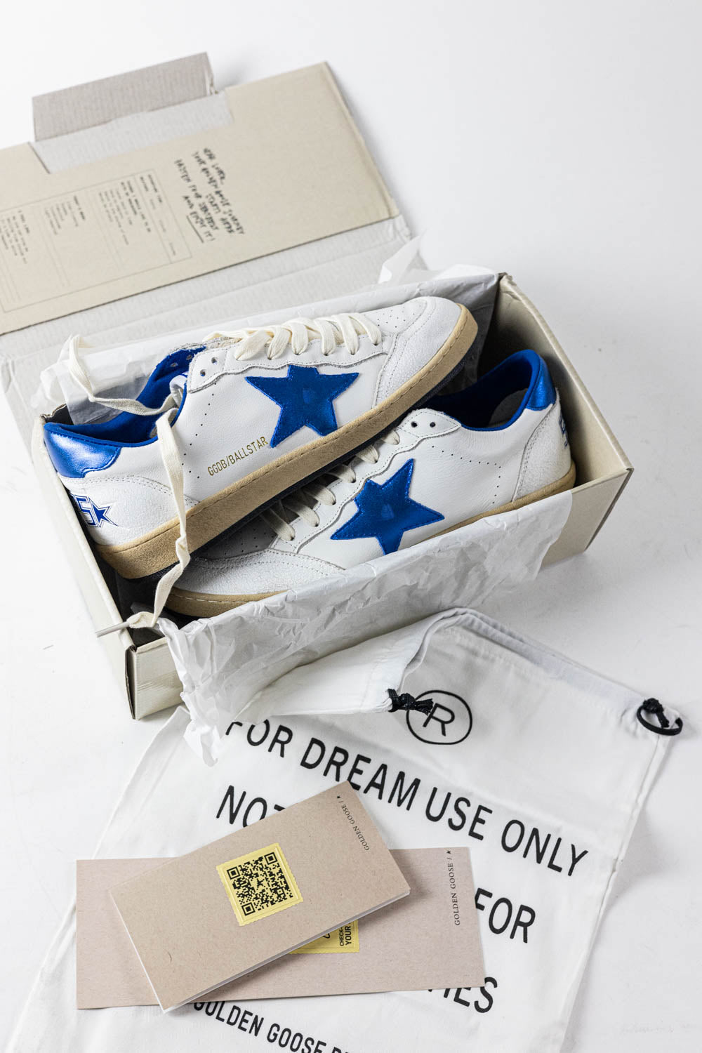 Golden Goose Ball Star in white nappa leather with a blue star and heel
