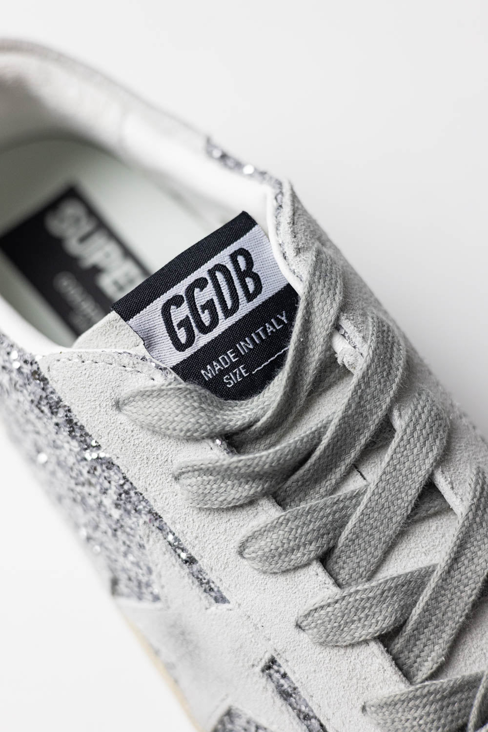 Golden Goose Hi Star with silver glitter, suede star and white heel tab