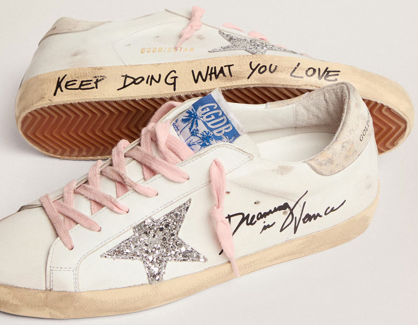 Golden Goose Super-Star with silver glitter star and leopard print heel tab