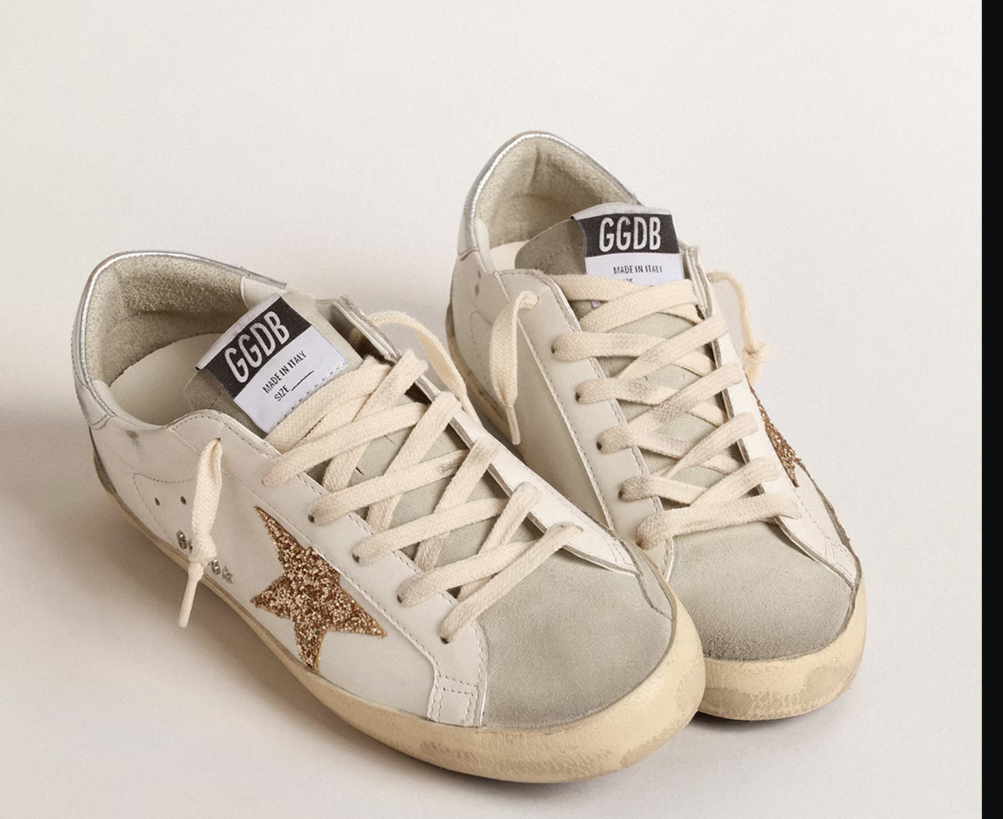 Golden Goose Super-Star with gold glitter star and ice suede appliqués