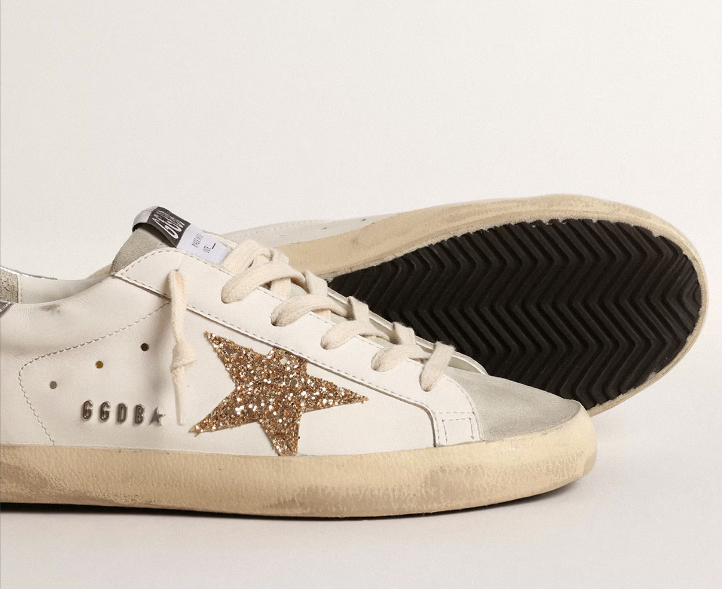 Golden Goose Super-Star with gold glitter star and ice suede appliqués