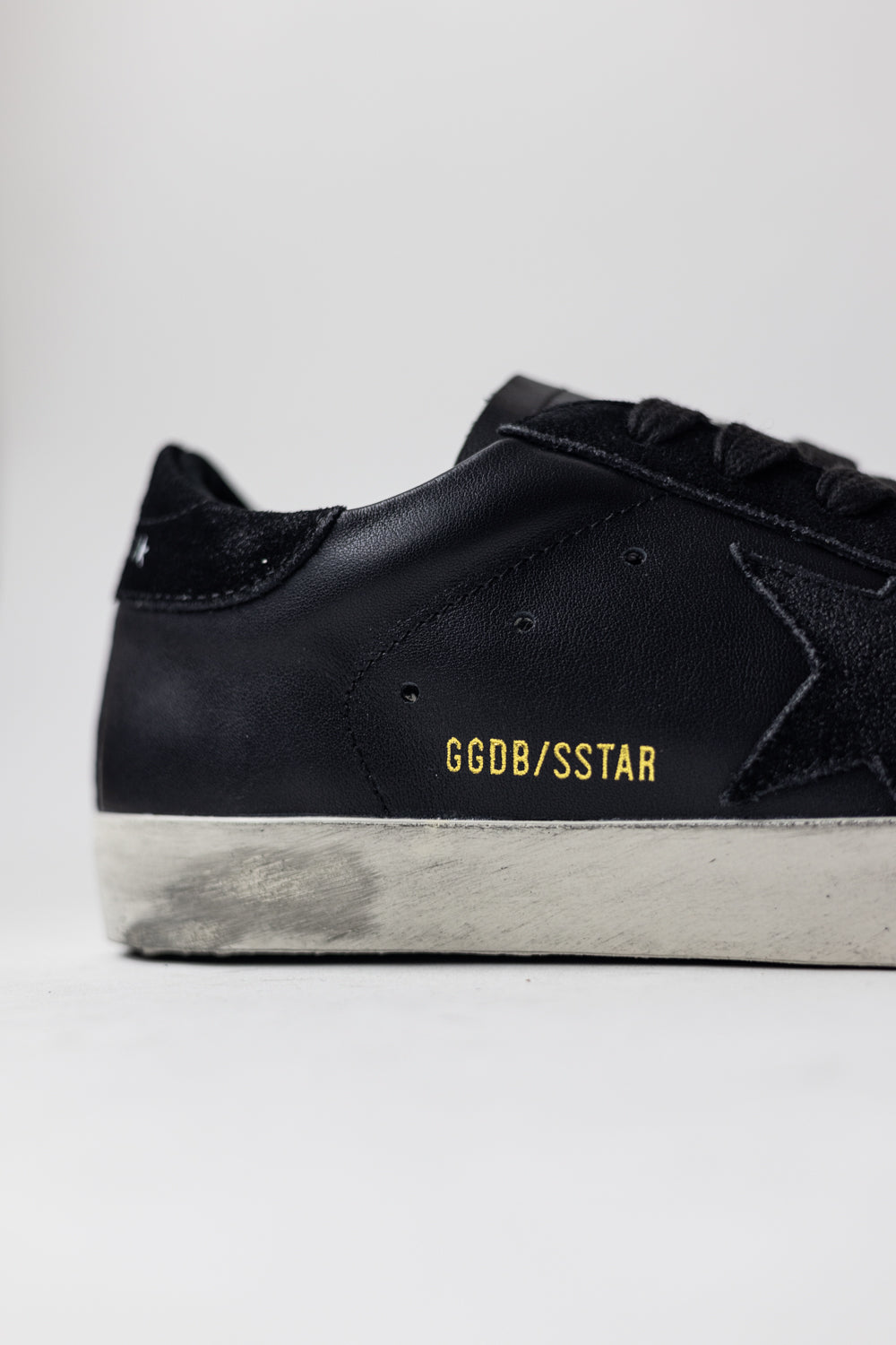 Golden Goose Super-Star in black nappa with black suede star and heel tab