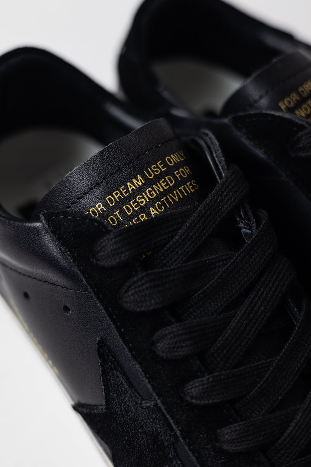 Golden Goose Super-Star in black nappa with black suede star and heel tab