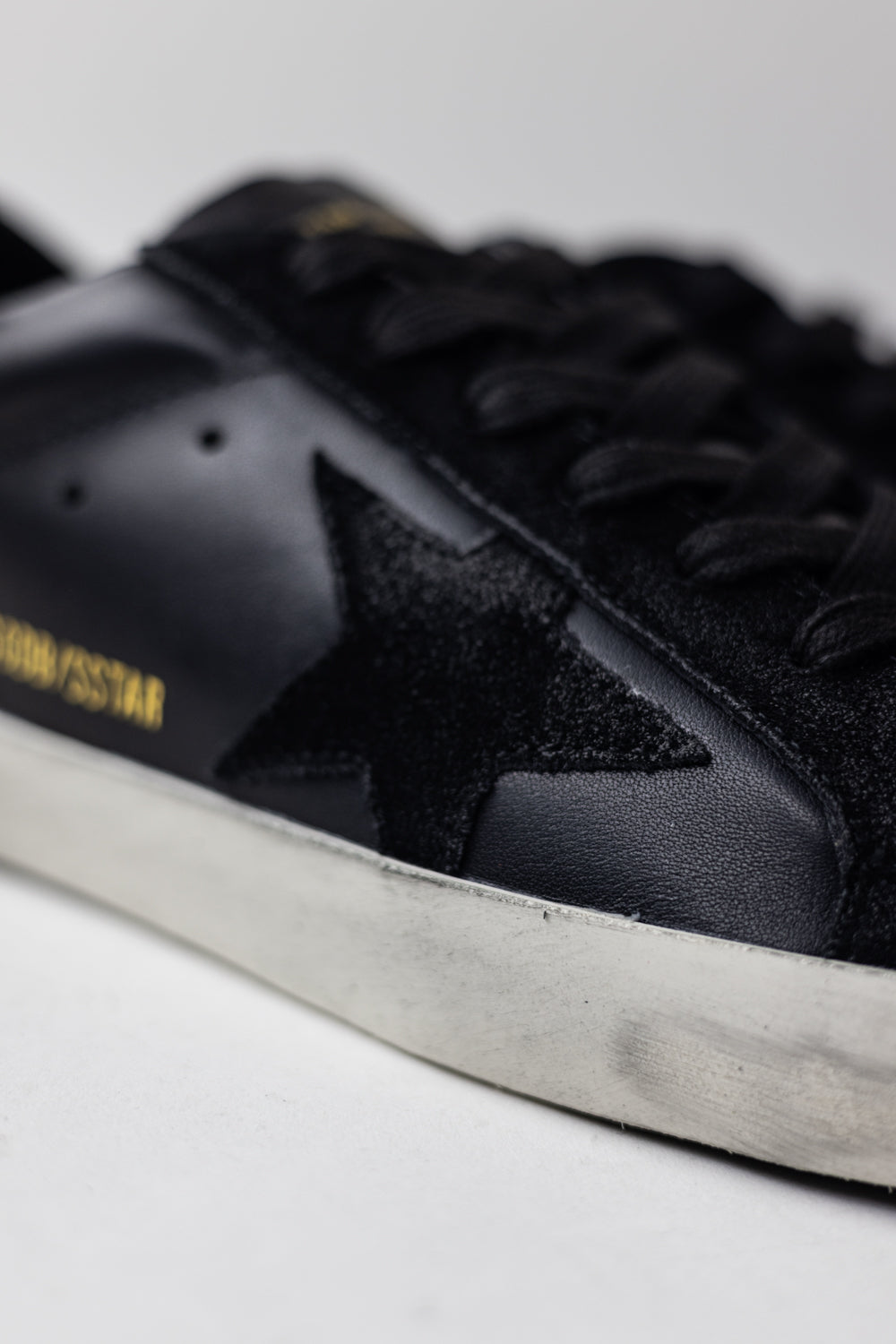 Golden Goose Super-Star in black nappa with black suede star and heel tab