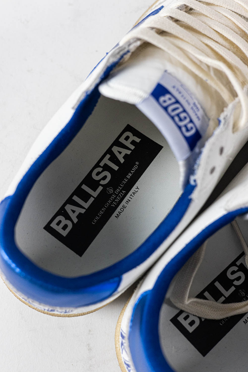 Golden Goose Ball Star in white nappa leather with a blue star and heel