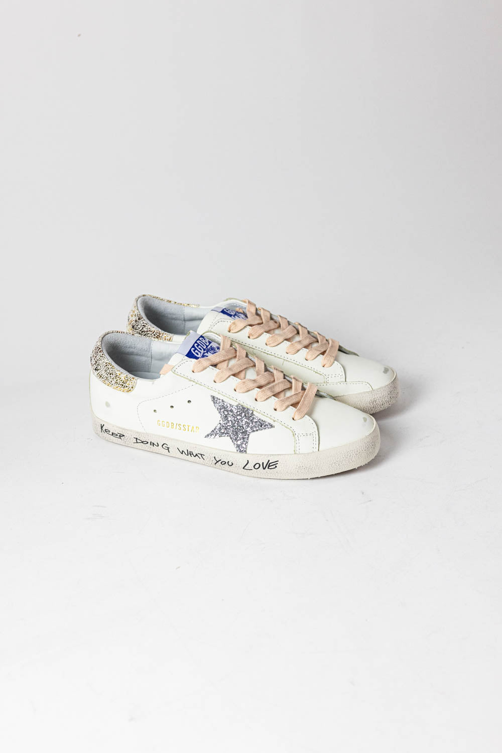 Golden Goose Super-Star with silver glitter star and leopard print heel tab