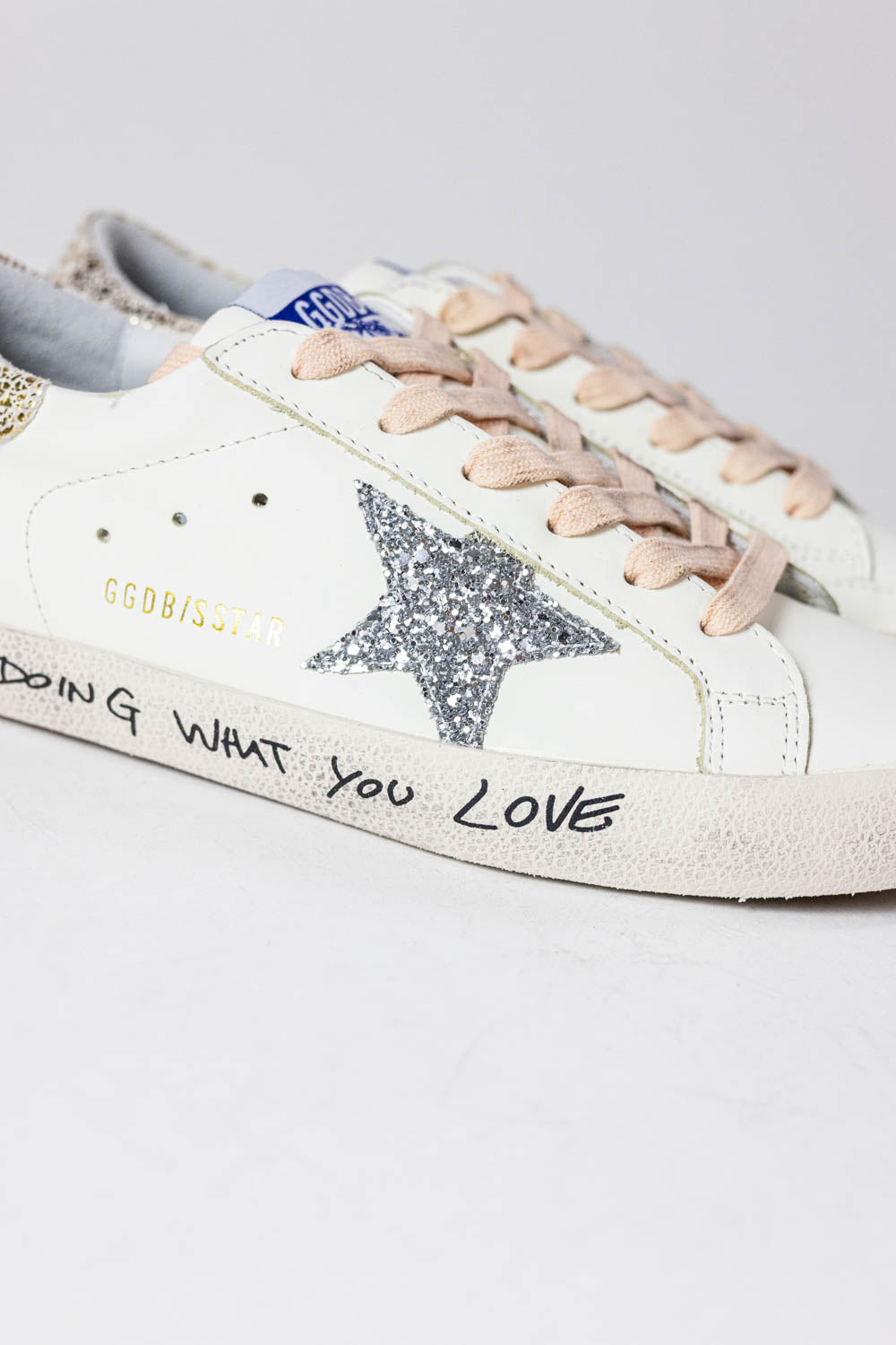 Golden Goose Super-Star with silver glitter star and leopard print heel tab