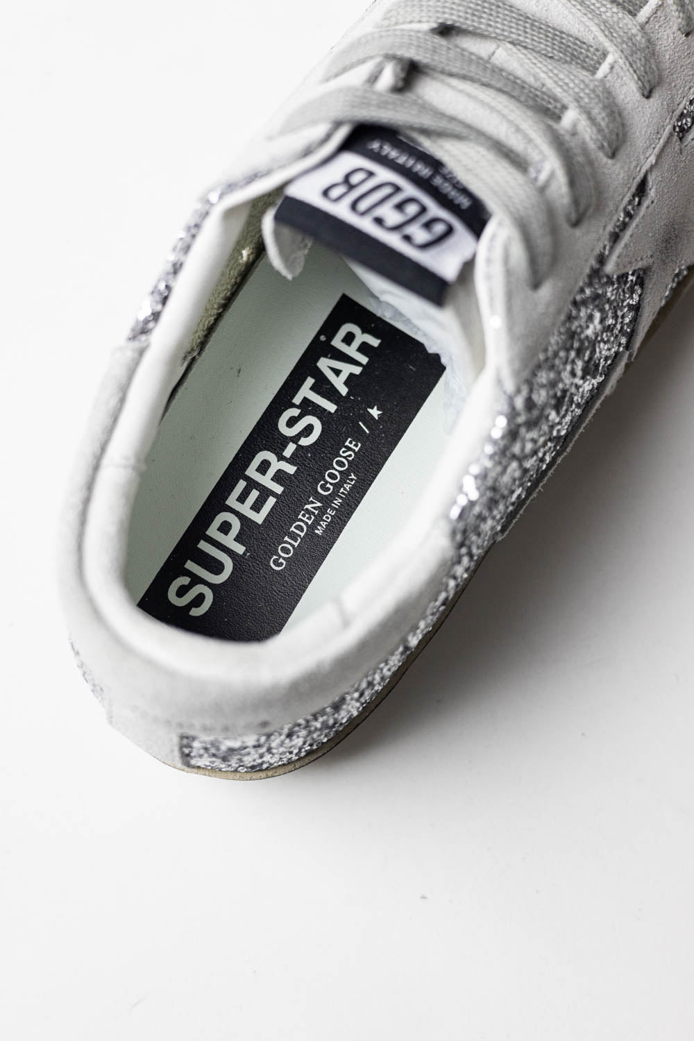 Golden Goose Hi Star with silver glitter, suede star and white heel tab