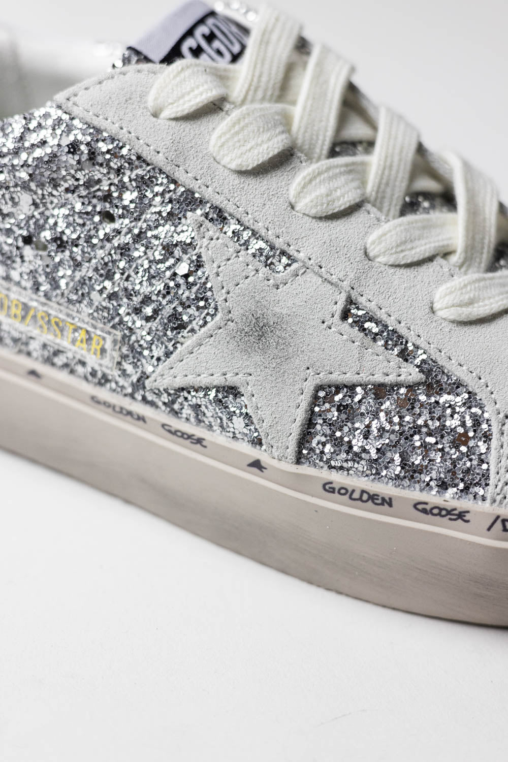 Golden Goose Hi Star with silver glitter, suede star and white heel tab