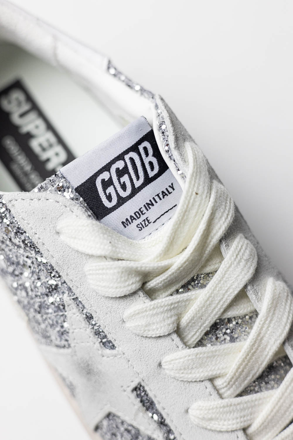 Golden Goose Hi Star with silver glitter, suede star and white heel tab