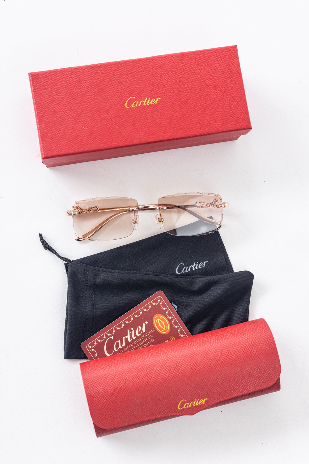 CARTIER Leopard Rimless Sunglasses Pink