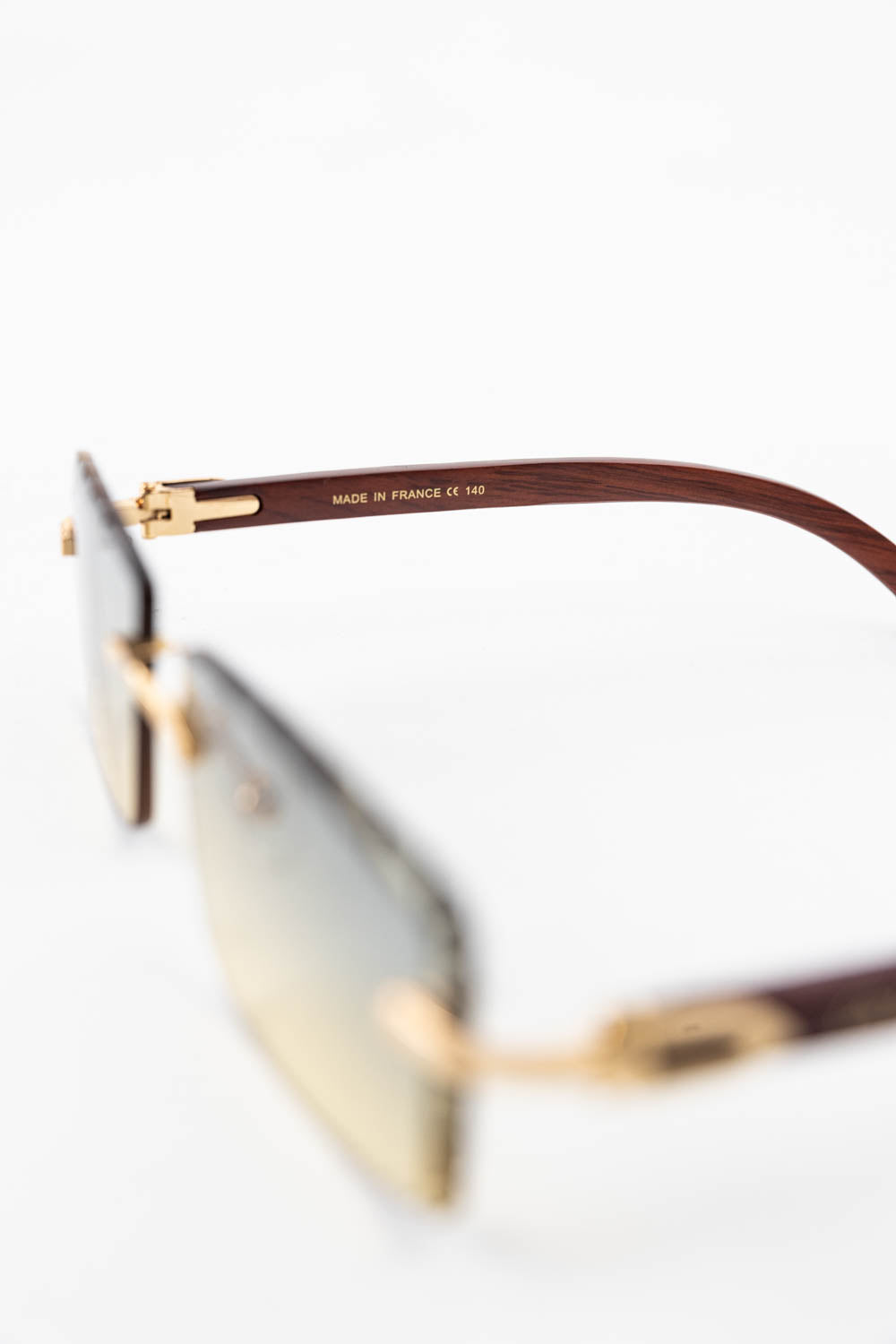 Cartier Light Wood Glasses with Gold C Decor and Honey Brown Lens