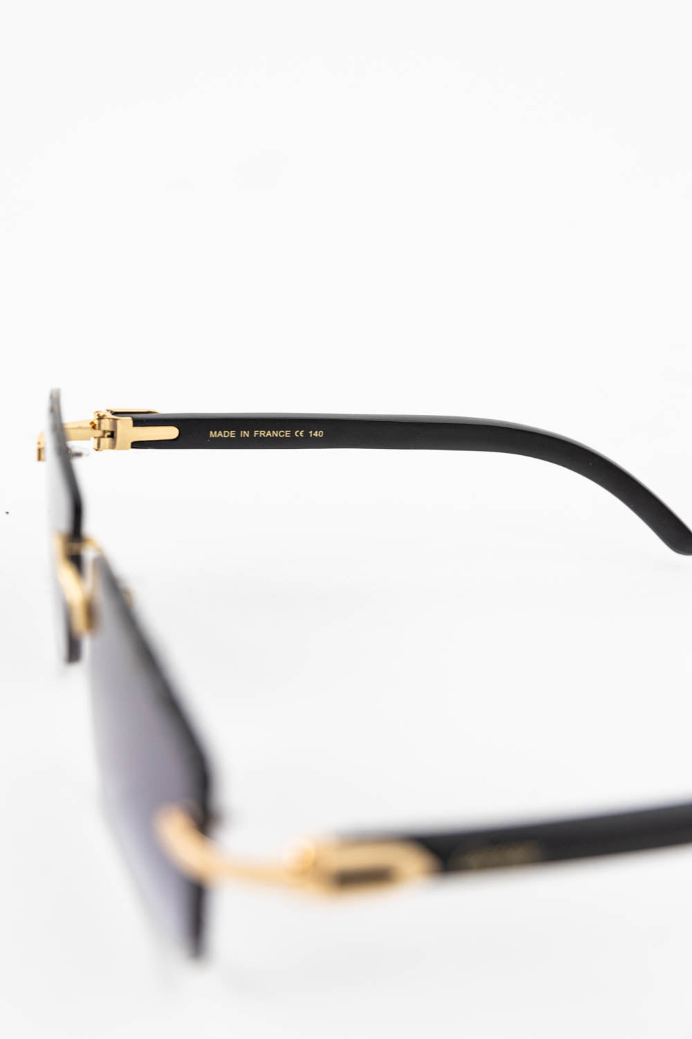 Cartier Black Wood Glasses with Gold C Decor and Blue Lens