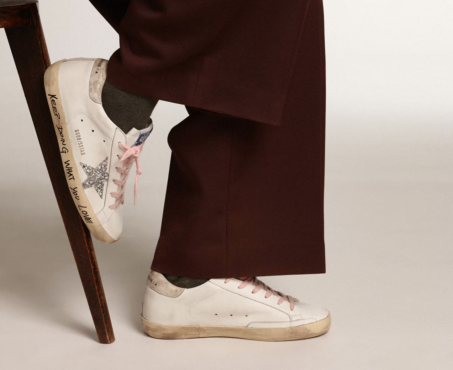 Golden Goose Super-Star with silver glitter star and leopard print heel tab